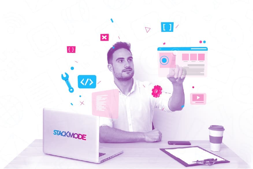 Innovative web developer working on coding and digital marketing strategies at desk with laptop and graphic icons.