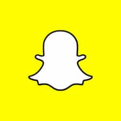 Snapchat logo on bright yellow background, representing social media app and digital marketing platform.